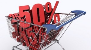 Shopping cart full of percentage. Concept of discount.