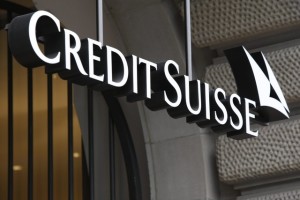 Logo of the Credit Suisse at the entrance of the headquarter in Zurich, Switzerland, Thursday, October 22, 2009. Credit Suisse Group reported a 2.4 billion Swiss franc (Euro 1.9 billion, $2.4 billion) net income during the third quarter as it continued strengthening its position following losses caused by the economic crisis. (KEYSTONE/Steffen Schmidt)
